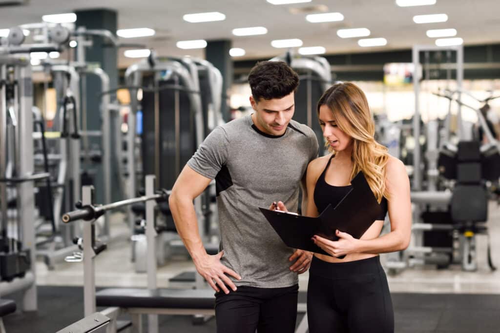a personal trainer documenting their client's progress